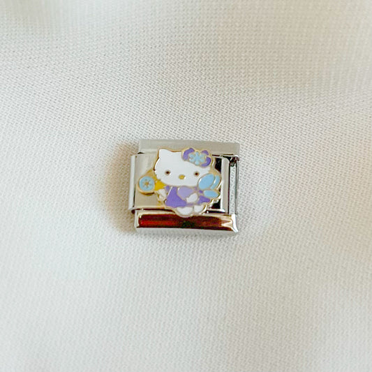 Charm hello kitty morado