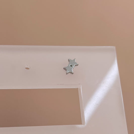 PIERCING DOBLE ESTRELLA