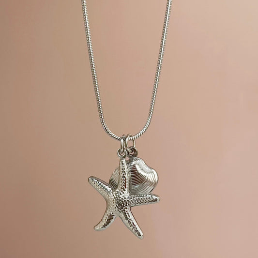 COLLAR ESTRELLA CONCHA PLATEADO