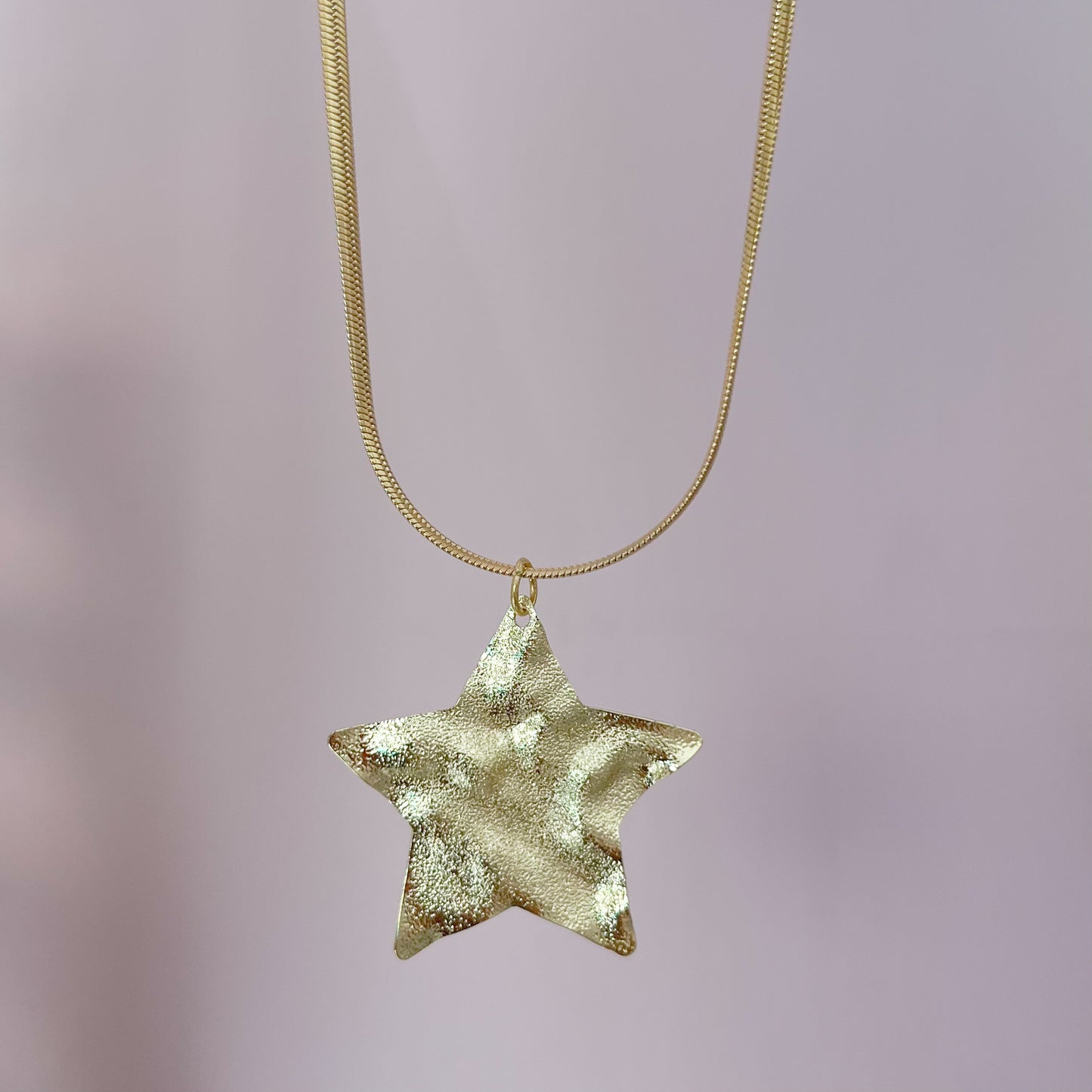 COLLAR ESTRELLA PLANCHADO