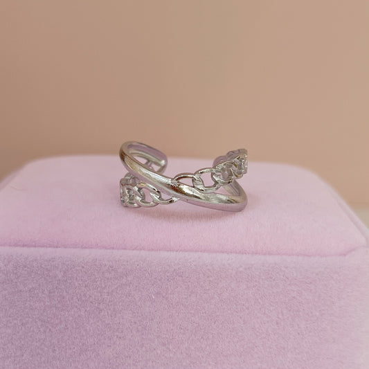 ANILLO CRUZADO PLATEADO