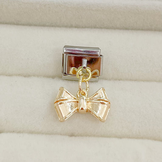 CHARM MOÑO COLGANTE